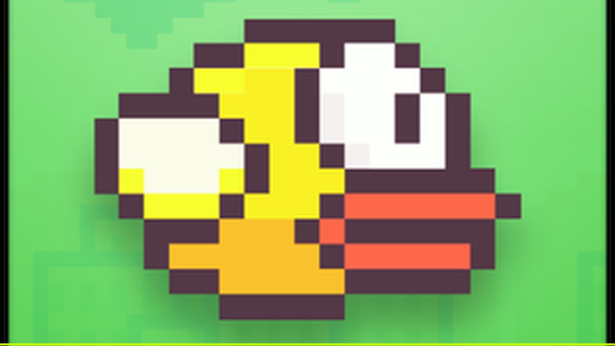 Flappy Bird flying between green pipes in a browser remake on SchoolBros